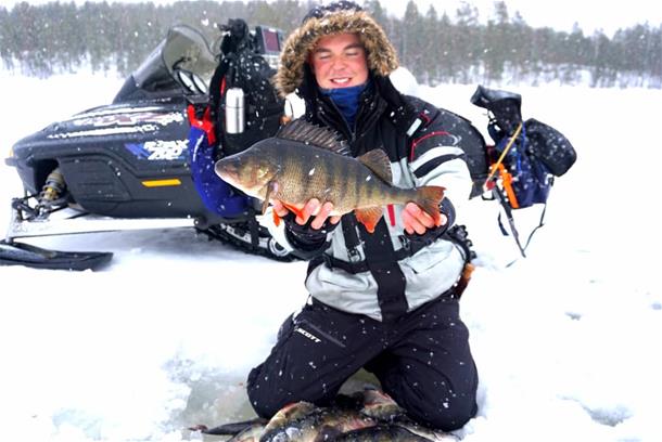 Ice fishing safari by snowmobile